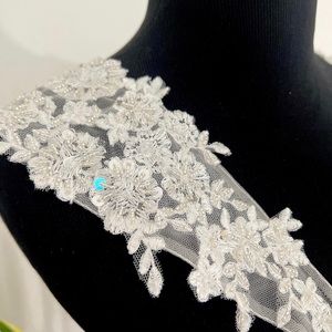 Handmade, sequined, french lace, off the shoulder straps for wedding gown.